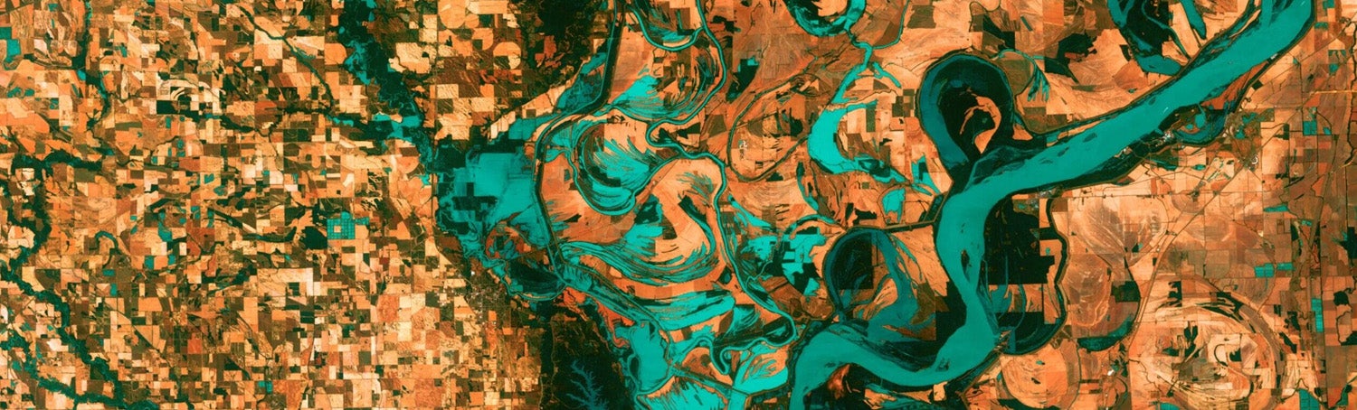 satellite imagery of a river, its tributaries, and surrounding land