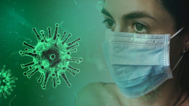 Woman in face mask and virus cell