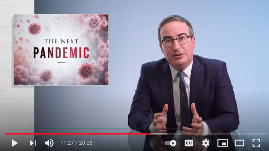 John Oliver on set, talking about the next pandemic
