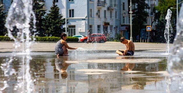Kids playing in fountain
