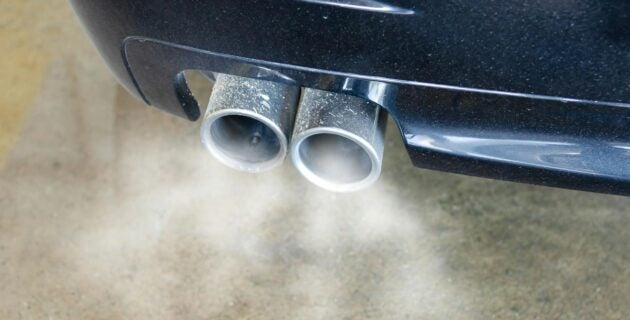 pollution from a car exhaust pipe