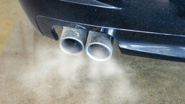 pollution from a car exhaust pipe