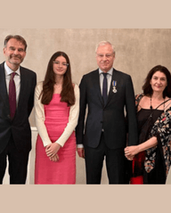 photo of Dutch Ambassador André Haspels, Albert Hofman's daughter Carmela, Albert Hofman, and Hofman's wife Maite Suarez