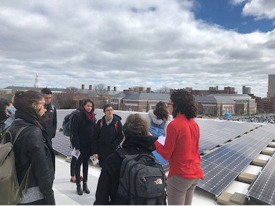 Students touring the roof of the Harvard Business School building.