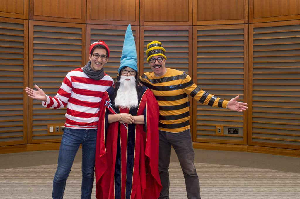 IID Retreat 2018 - Phyllis Kanki, dressed up as a wizard with Don Hamel on her left and Bobby Brooke Herrera on her right