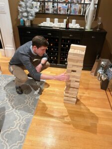 Zintis carefully studies the tower and plans his move.