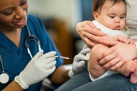 A baby receiving vaccination.