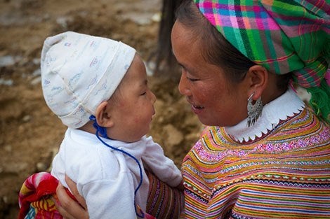 Flower Hmong mother and baby in Vietnam