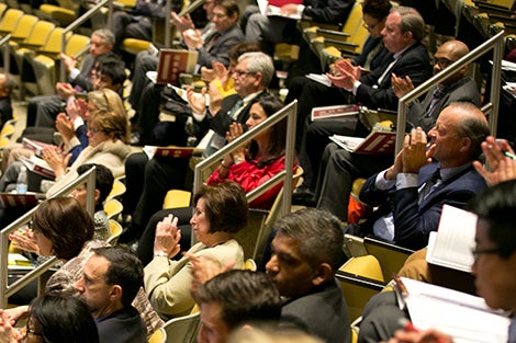 Audience members applaud speakers at the Building A Culture of Health: A New Imperative for Business conference.