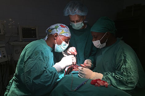 A Boston doc treats facial trauma in Rwanda