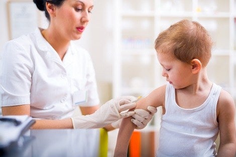 Boy receiving a vaccination