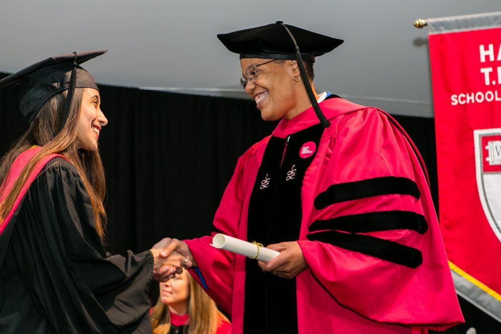 Dean Michelle Williams giving diploma
