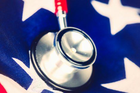 An American flag and stethoscope