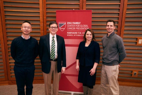 Timothy Rebbeck, second from left, with PEER Award recipients Xuehong Zhang (left), Lorelei Mucci, and Jeffrey Miller