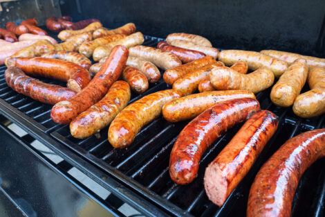 sausages on a grill