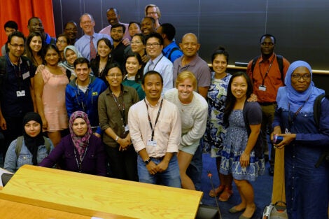 Paul Farmer with students from the Global Health Delivery Intensive program in 2018.