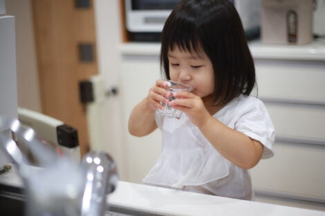 Girl drinking tap water