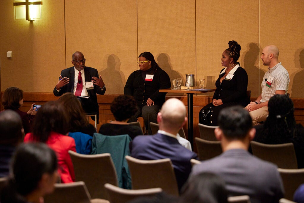 David Williams (left) at panel on racial justice and equity in health