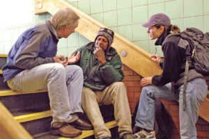 Jill Roncarati and Boston Health Care for the Homeless Program (BHCHP) President Jim O’Connell (pictured in 2006) meet with a “rough sleeper.” 