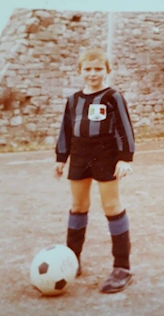 Andrea Baccarelli as a boy, with soccer ball