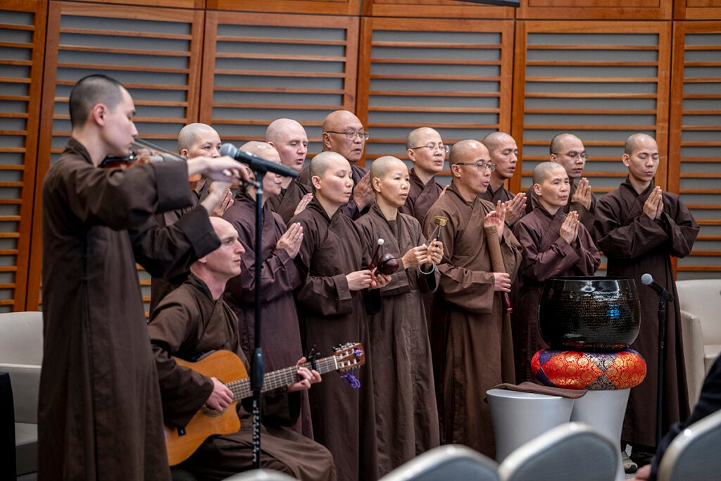 Monks and nuns, all disciples of Thich Nhat Hanh, chant Namo Avalokiteshvaraya, the Chant of Compassion