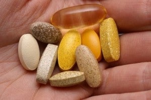 Multivitamins in the palm of a hand