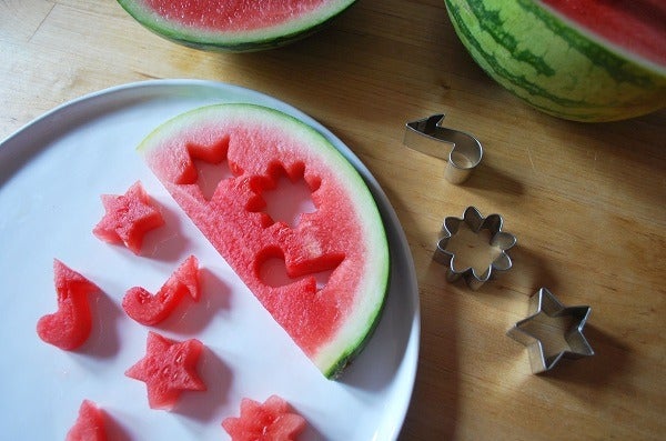 Watermelon slice with cut out shapes
