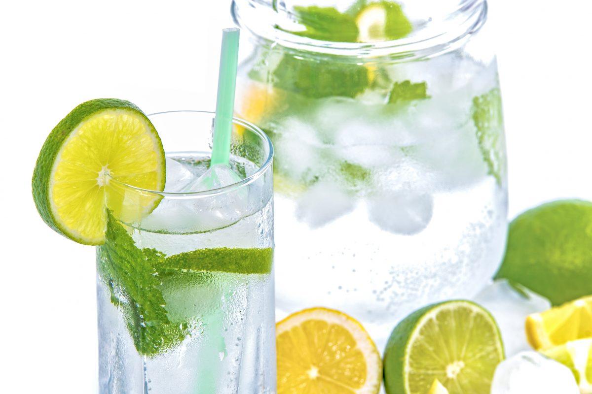 water with limes, lemons, mint, and ice