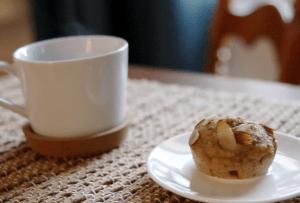 Chickpea lemon cardamom muffin with coffee cup
