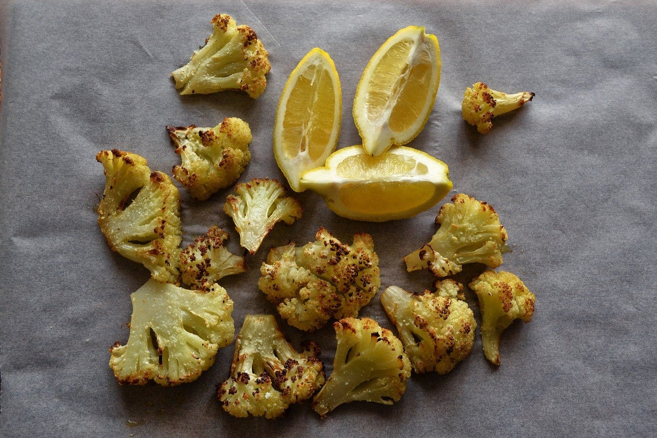 cauliflower and lemon on a tray