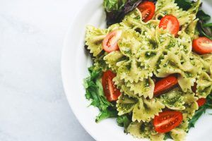 pasta with pesto tomatoes and letuce