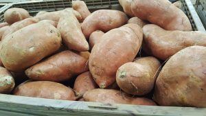 sweet potatoes in a crate