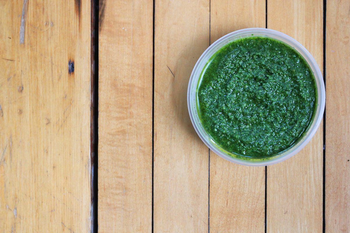 bright green pesto made with basil, spinach, and walnuts