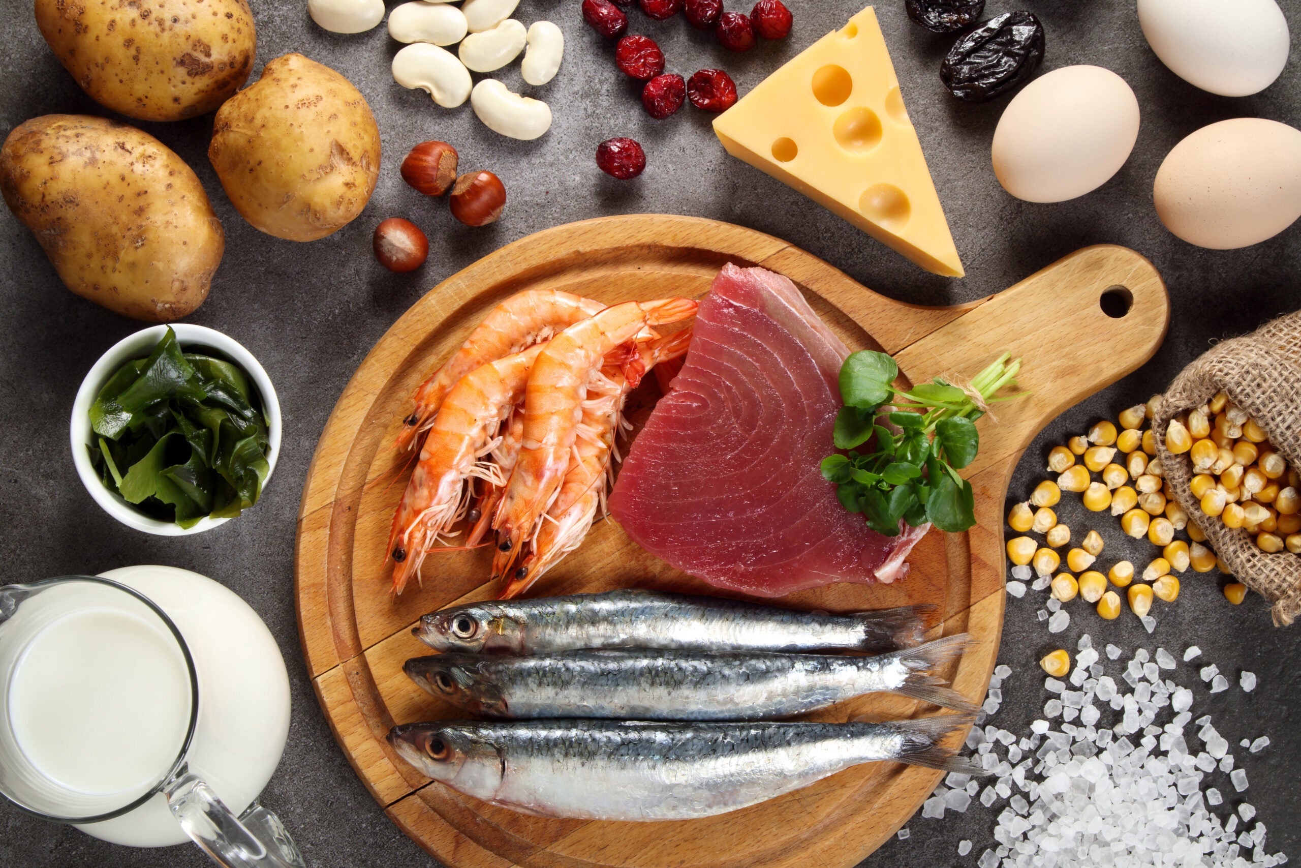 foods containing iodine, including a variety of fish, shellfish, iodized salt, milk, seaweed, nuts, seeds, potatoes, beans, eggs and a variety of dairy products including milk, cheese and yogurt.