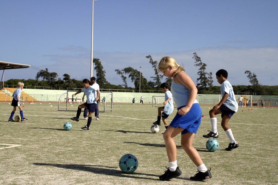 Children practicing soccer