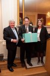 David Canning and Lisa Berkman present a gift from Tiffany to Lincoln Chen