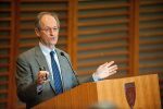 Sir Michael Marmot presents to audience