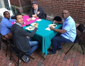 Researchers eat lunch outside