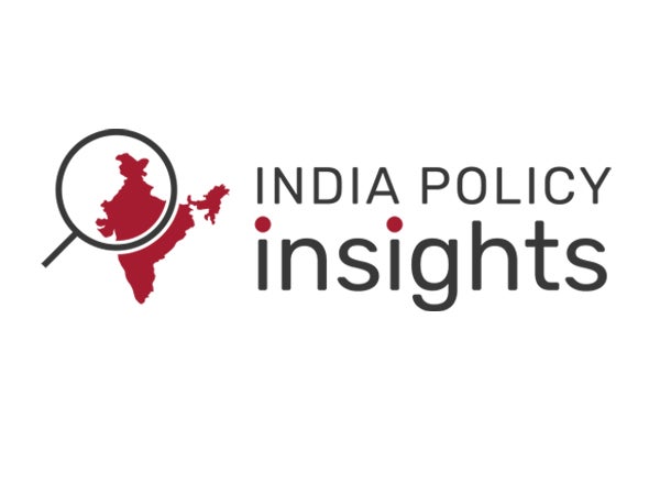 India Policy Insights logo: a magnifying glass over India