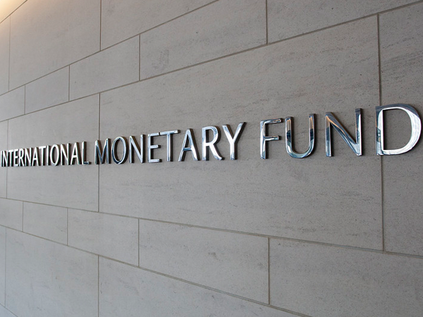 Photo of International Monetary Fund lettering on side of building