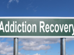 Sign that says "Addiction Recovery"