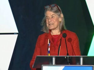 Lisa Berkman at podium at PAA 2024