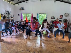 Jean Appolon and the Jean Appolon Expressions (JAE) education team leading a Haitian Folkloric dance class at a JAE 2022 partner site, Kalalu-Danza in the Dominican Republic