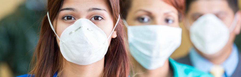 People wearing medical masks during flu or contagious pandemic