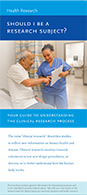 Cover of brochure for "Should I Be a Research Subject". Person in blue scrubs showing a clipboard to a person sitting.