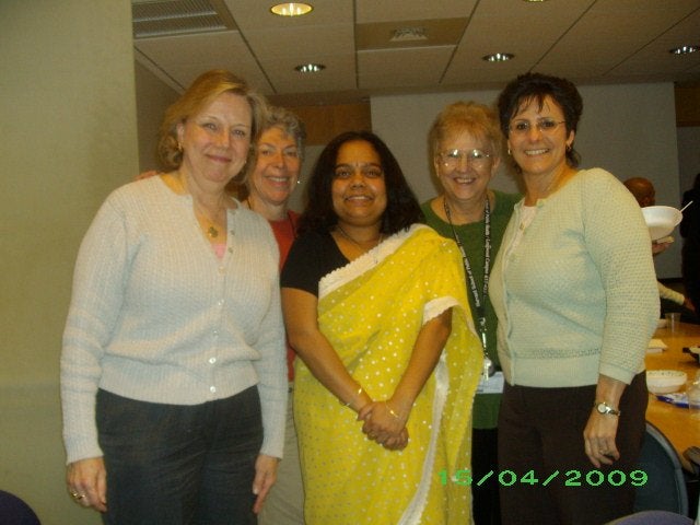 Mala with department staff members