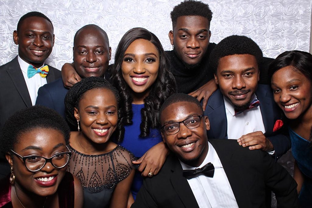 Nine students pose for photo during Harvard Chan Prom 2019