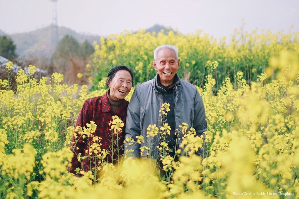 Older Adults Smiling in Field