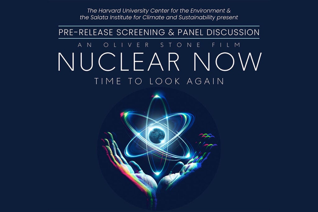 Poster for NUCLEAR NOW showing hands cradling a stylized atom