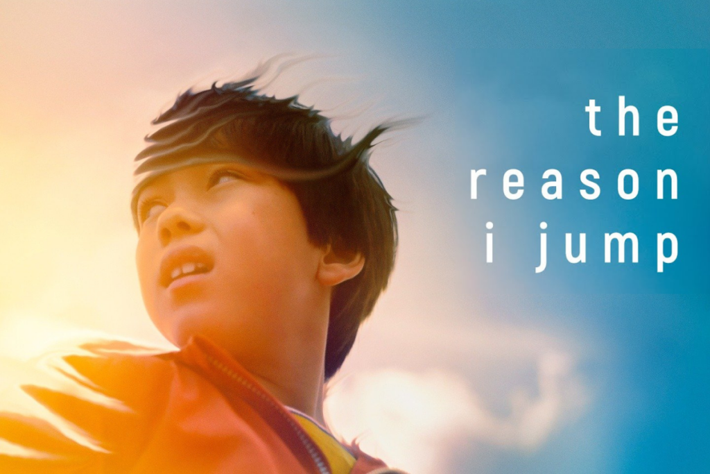 Photo of a boy looking to the left in front of a colorful sky with the words "The reason I jump" written in white to the right.